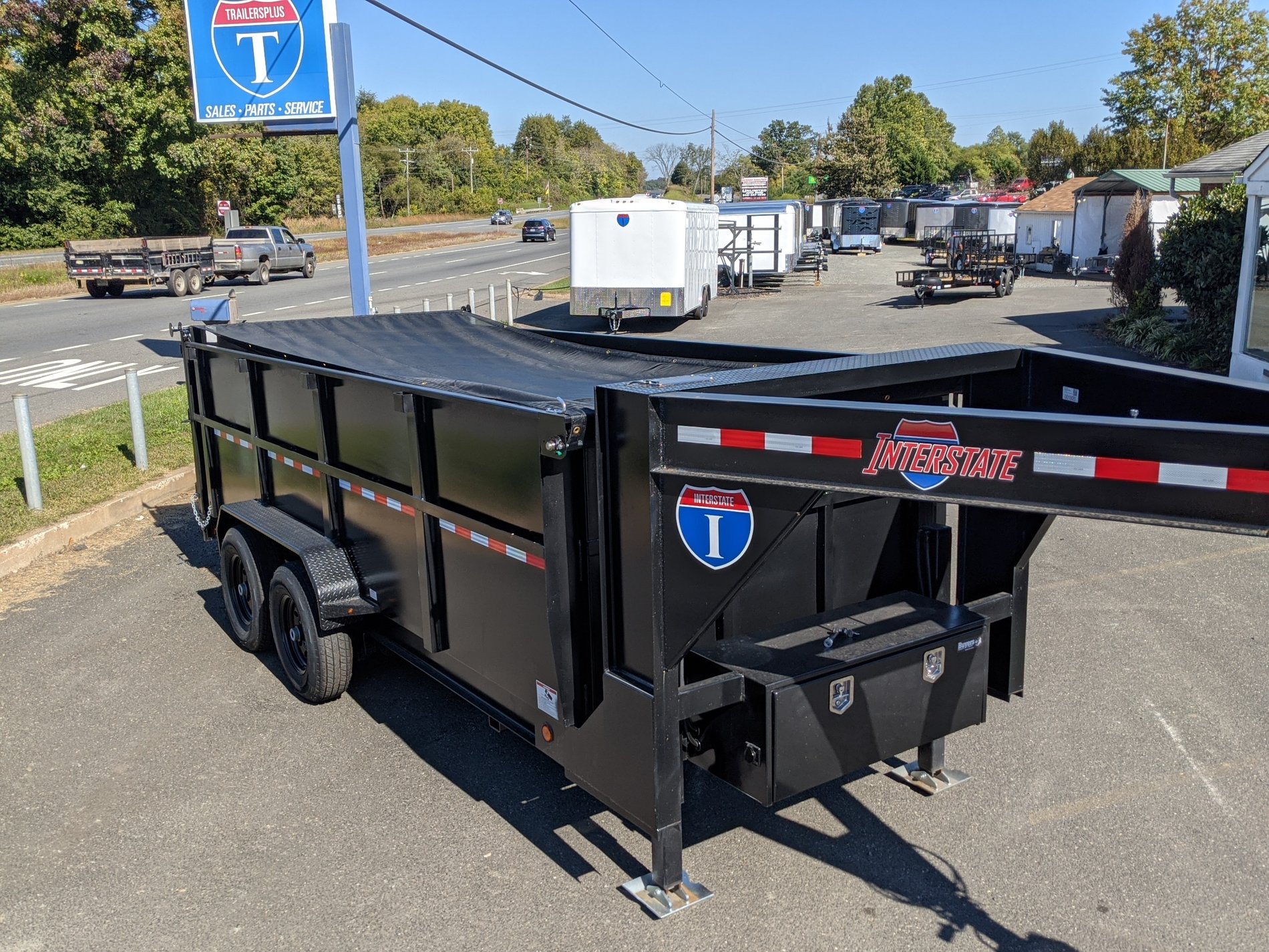 Interstate dump trailer with dump tarp attached